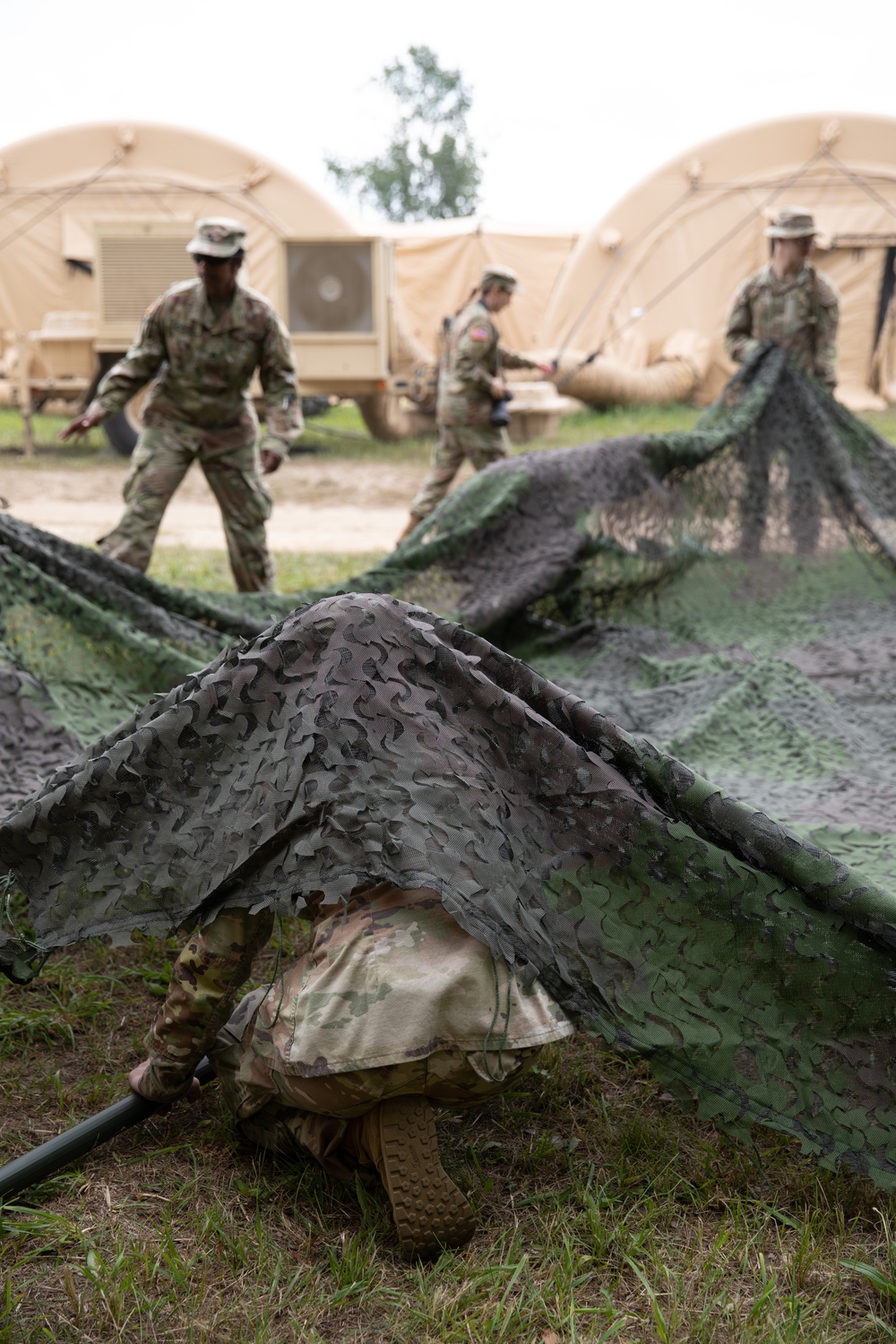 205th Medical Company Ground Ambulance set up a tent during Northern Strike.