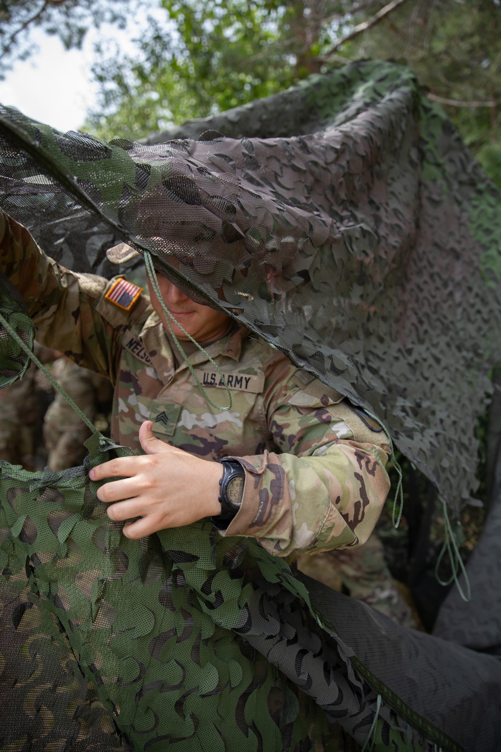 205th Medical Company Ground Ambulance set up a tent during Northern Strike.