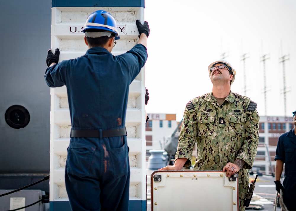 USS Porter Conducts VLS Rearm Event with USNS William Mclean