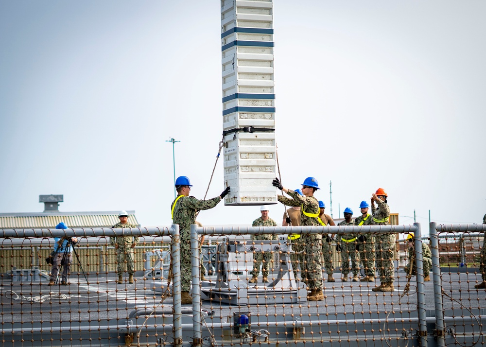 USS Porter Conducts VLS Rearm Event with USNS William Mclean