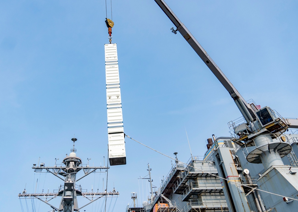 USS Porter Conducts VLS Rearm Event with USNS William Mclean