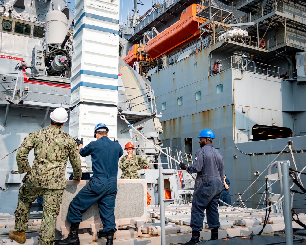 USS Porter Conducts VLS Rearm Event with USNS William Mclean