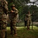 205th MCGA assembles camouflage netting