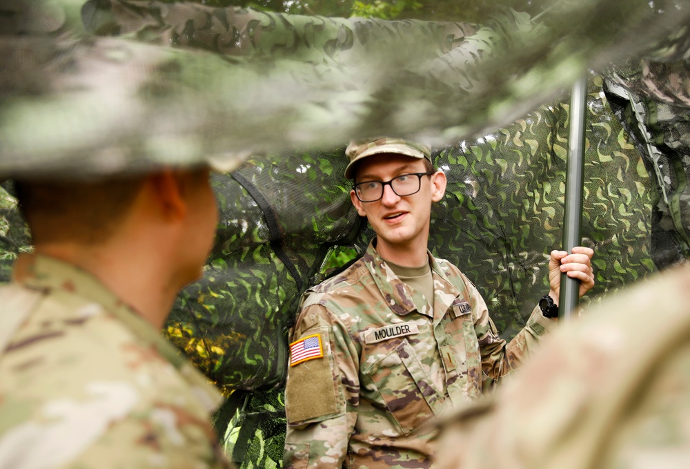 205th MCGA assembles camouflage netting
