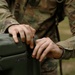 205th MCGA assembles camouflage netting