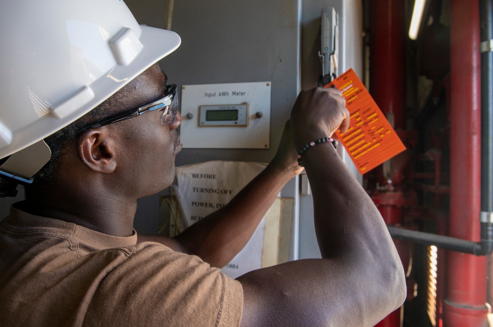 NAS Sigonella Public Works Department performs preventative maintenance on a static converter