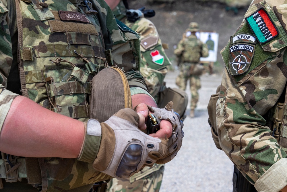 Hungarian soldiers practice firing at pistol range