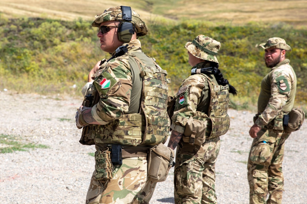 Hungarian soldiers practice firing at pistol range