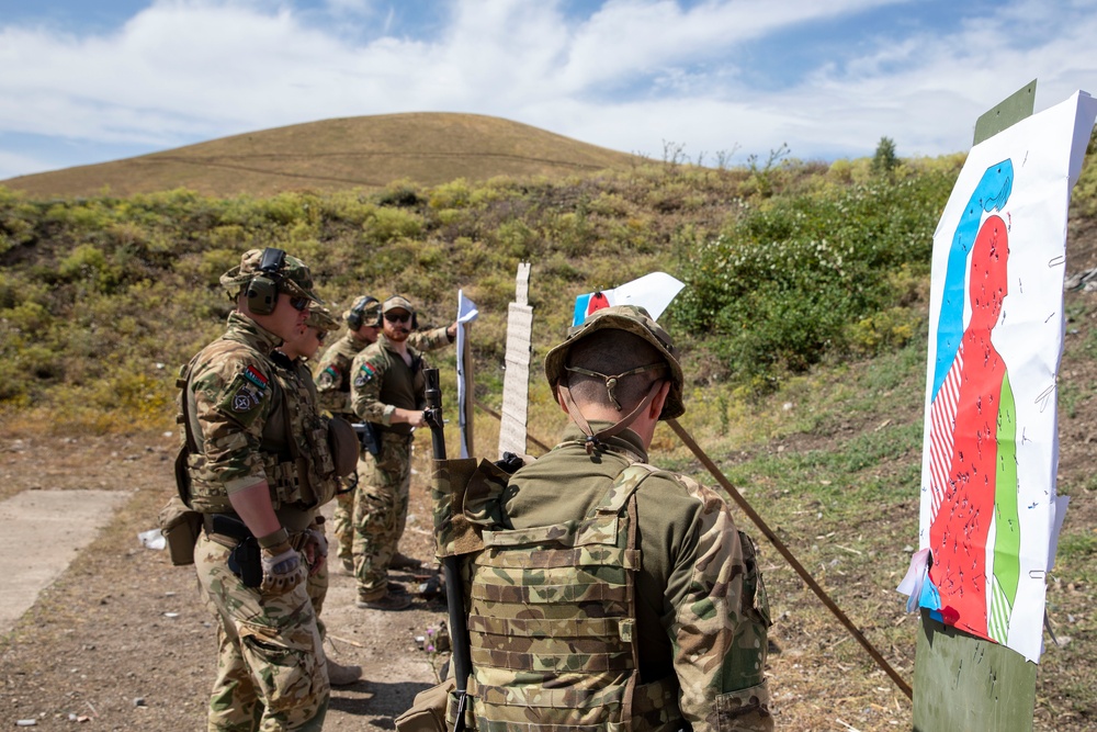 Hungarian soldiers practice firing at pistol range