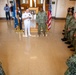 Capt. Craig Mattingly Awards Aviation Electricians Mate 1st Class Steven Jeffries Navy and Marine Corps. Commendation Medal