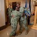 Capt. Craig Mattingly Awards Aviation Electricians Mate 1st Class Steven Jeffries Navy and Marine Corps. Commendation Medal