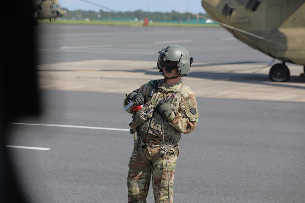 28th ECAB crew chief performs preflight check