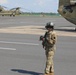 28th ECAB crew chief performs preflight check