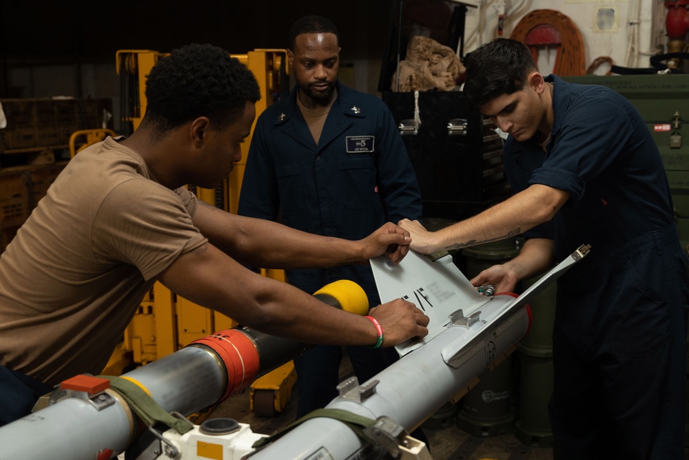 USS Bataan Sailors assemble a missile