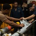 USS Bataan Sailors assemble a missile