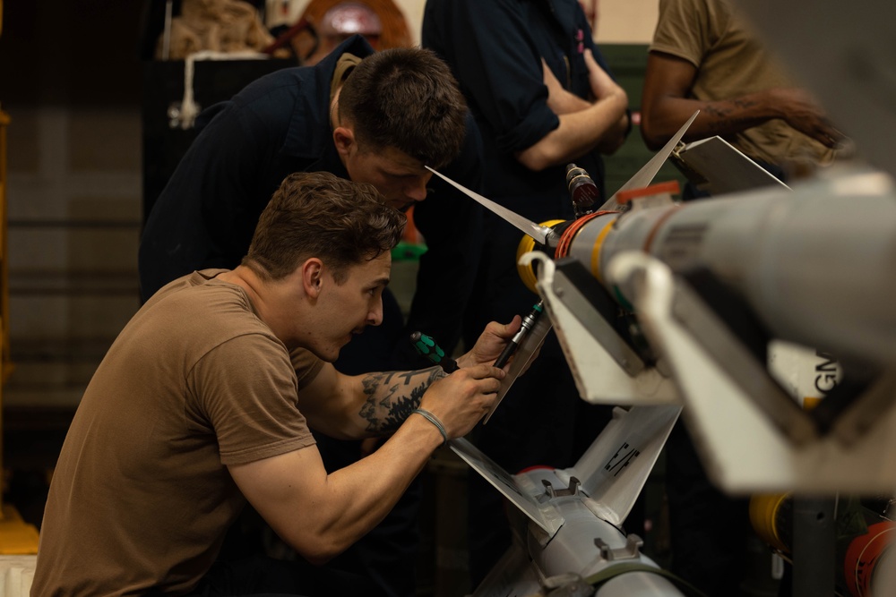 USS Bataan Sailors assemble a missile