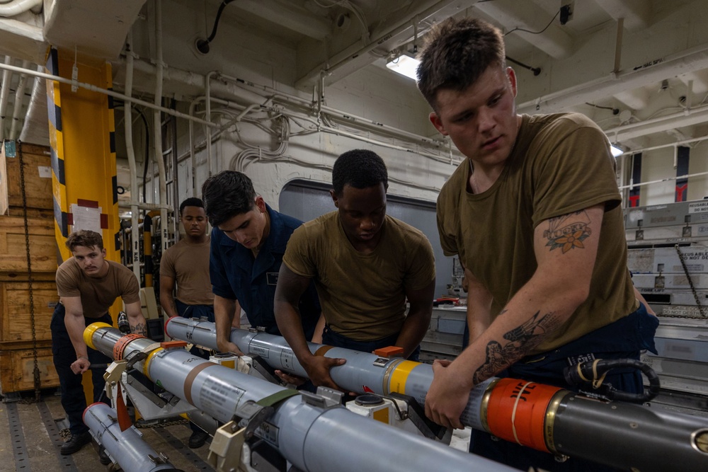 USS Bataan Sailors assemble a missile