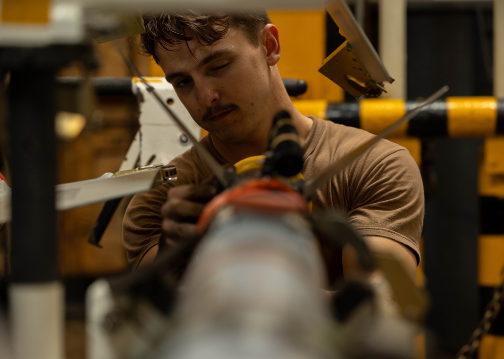 USS Bataan Sailors assemble a missile