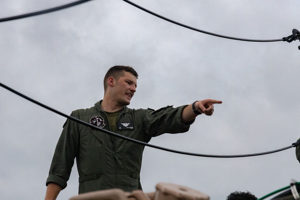 U.S. Marines load gear onto KC-130J Hercules in support of Large Scale Exercise 2023