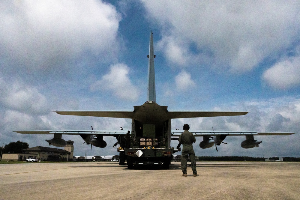 U.S. Marines load gear onto KC-130J Hercules in support of Large Scale Exercise 2023