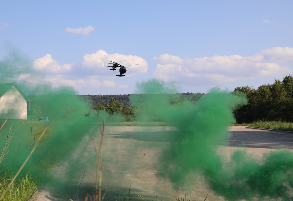 UH-60 Black Hawks land to extract soldiers