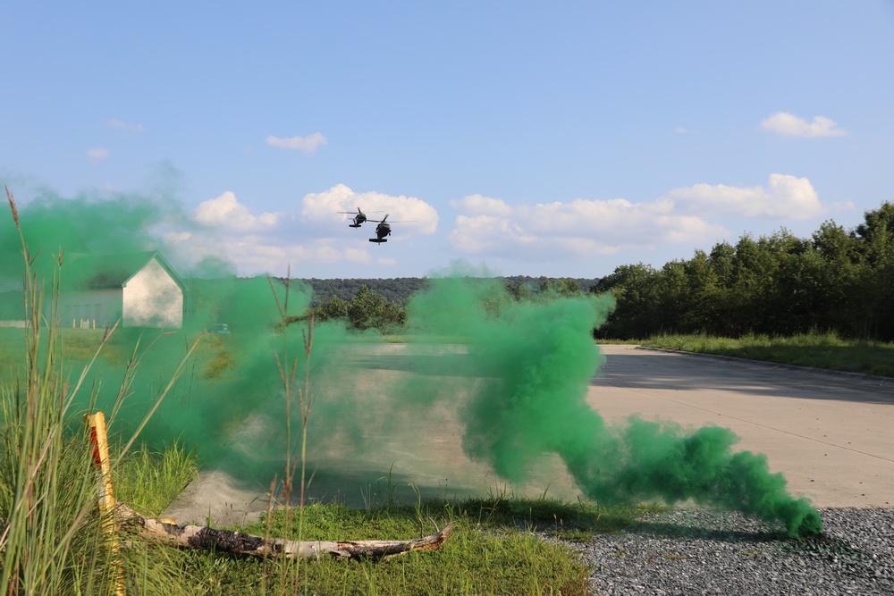 UH-60 Black Hawks land to extract soldiers