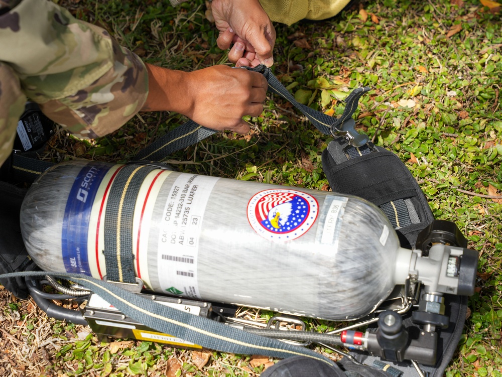 JTF-RH roving security and fire watch team members conduct SCBA training on Ford Island