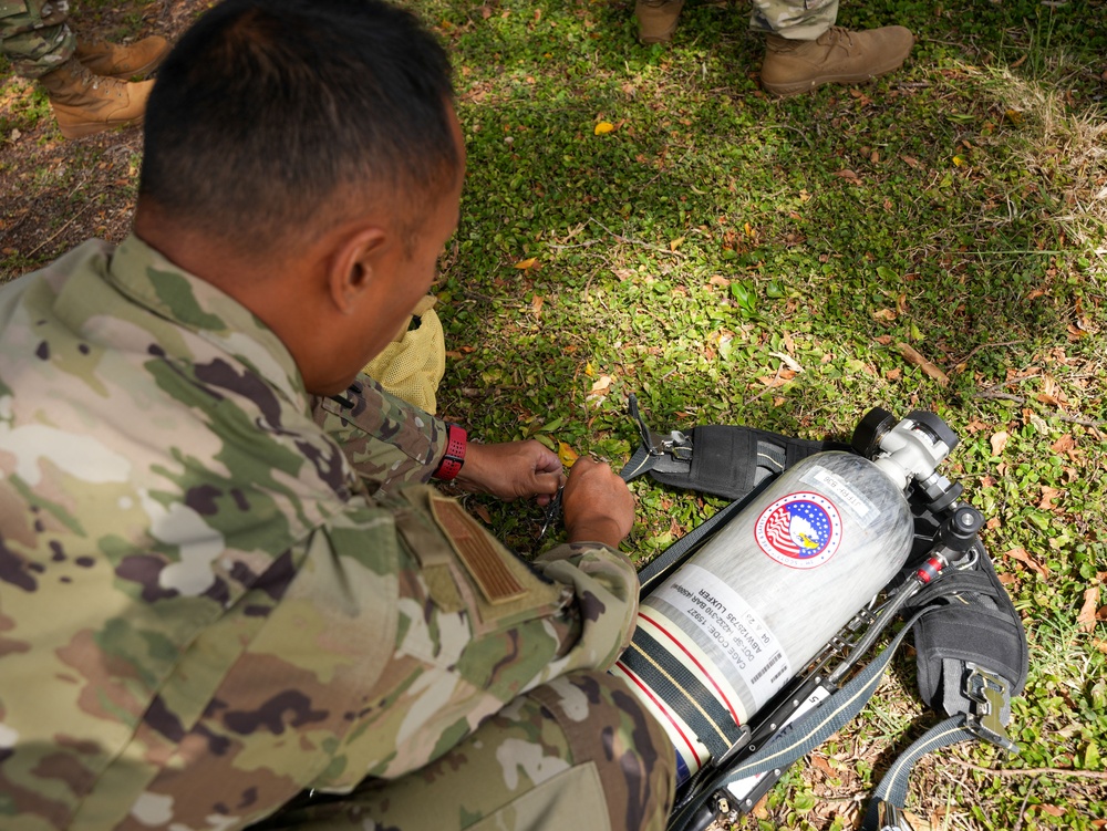 JTF-RH roving security and fire watch team members conduct SCBA training on Ford Island