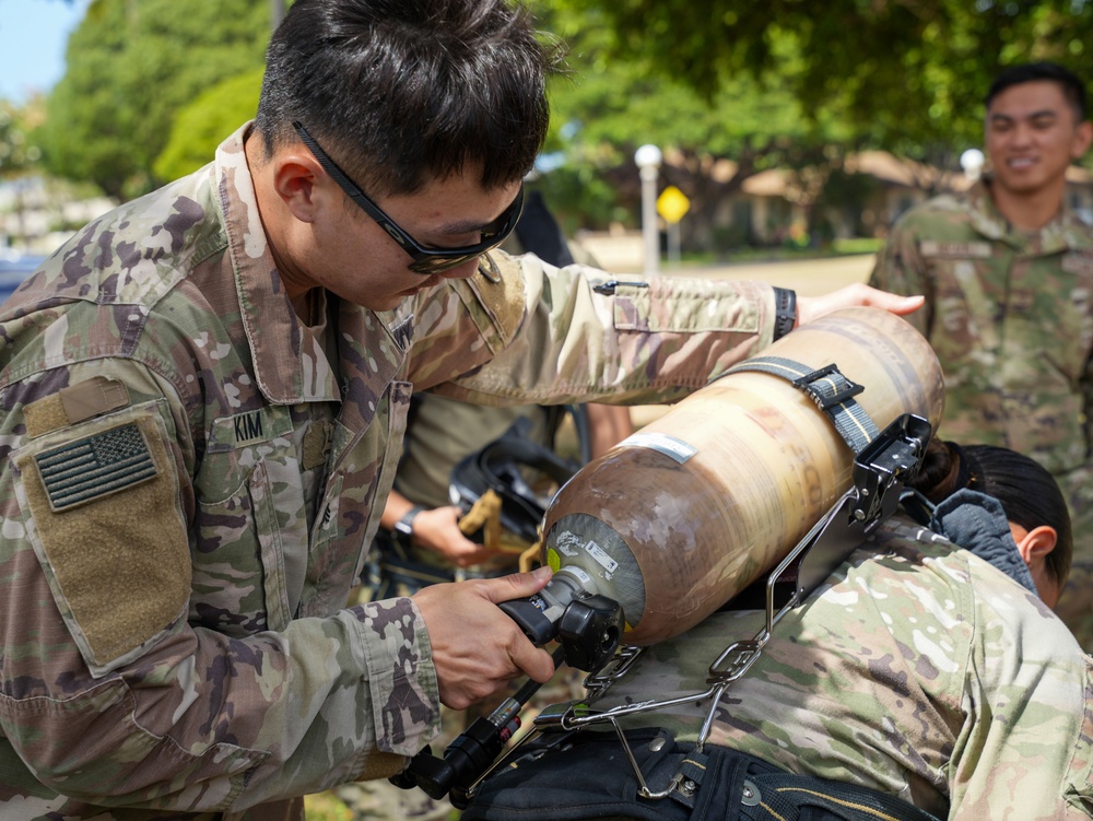 JTF-RH roving security and fire watch team members conduct SCBA training on Ford Island