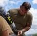 JTF-RH roving security and fire watch team members conduct SCBA training on Ford Island