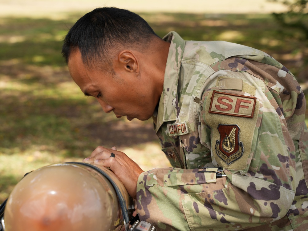 JTF-RH roving security and fire watch team members conduct SCBA training on Ford Island