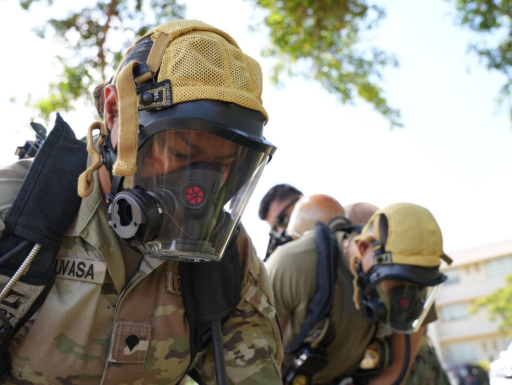 JTF-RH roving security and fire watch team members conduct SCBA training on Ford Island