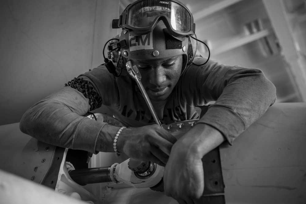 Sailor Aboard USS Carl Vinson (CVN 70) Perform Maintenance