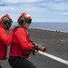 Sailor Aboard USS Carl Vinson (CVN 70) Participate in a Crash and Salvage Drill