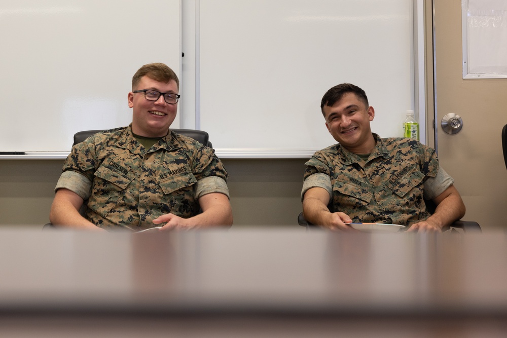 USO Foster provides pizza for Marines with CLR-3 for helping Camp Foster recover from Typhoon Khanun