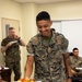 USO Foster provides pizza for Marines with CLR-3 for helping Camp Foster recover from Typhoon Khanun