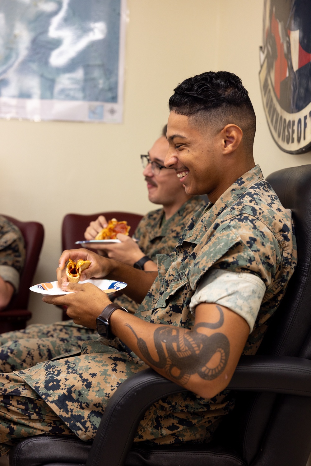 USO Foster provides pizza for Marines with CLR-3 for helping Camp Foster recover from Typhoon Khanun