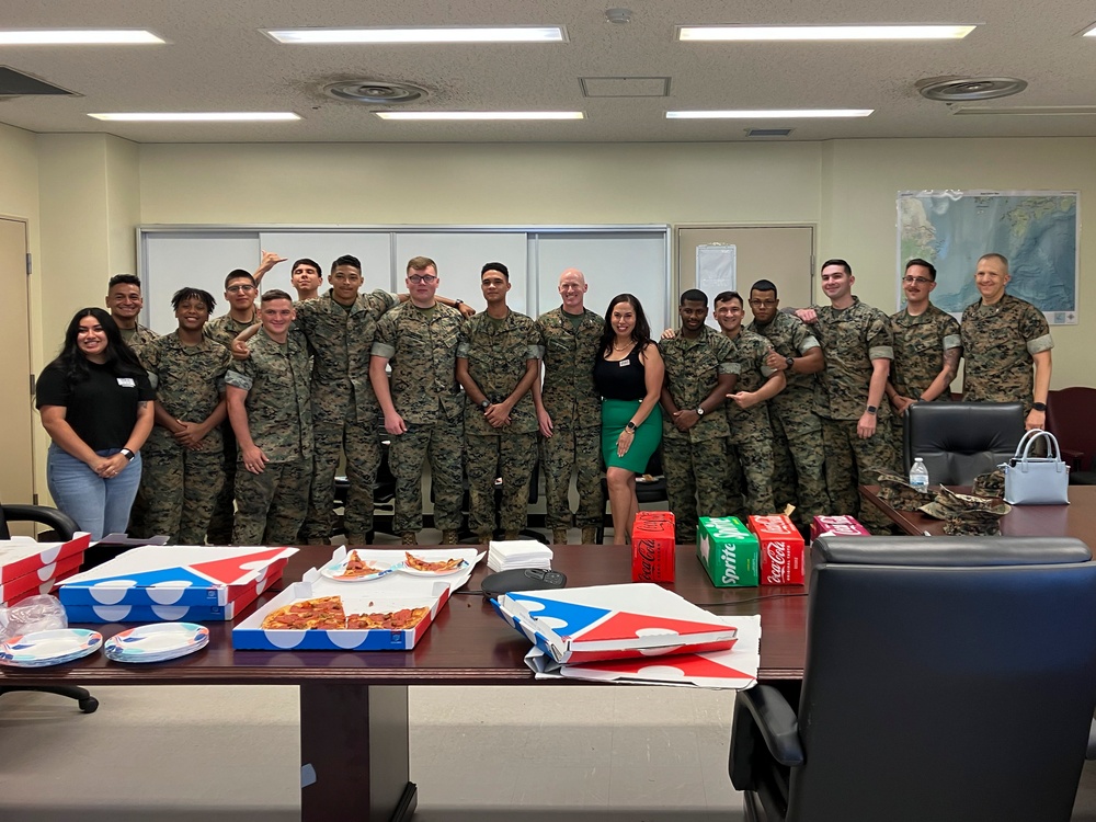 USO Foster provides pizza for Marines with CLR-3 for helping Camp Foster recover from Typhoon Khanun