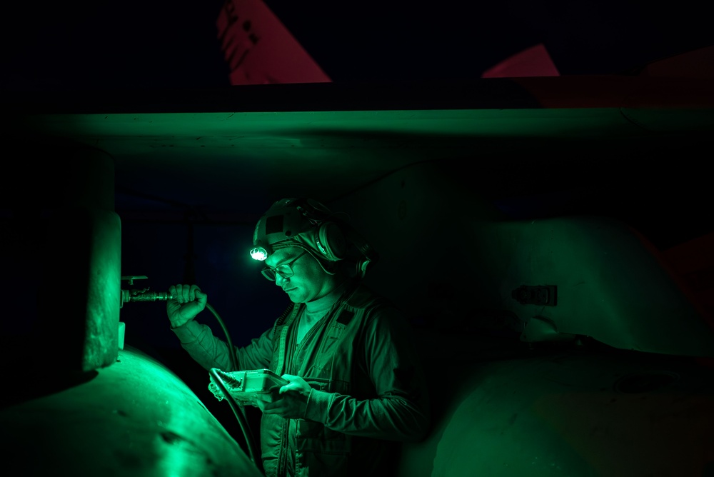 USS Carl Vinson (CVN 70) Sailor Conducts Routine Maintenance