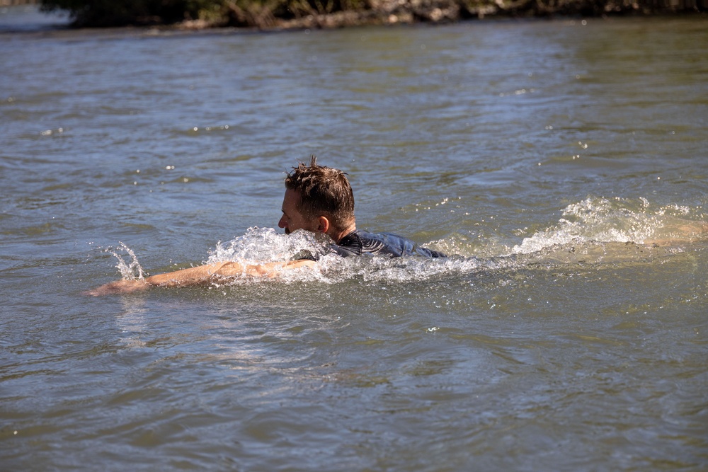 Mountain Medicine 1-23 conducts river crossing and sked raising