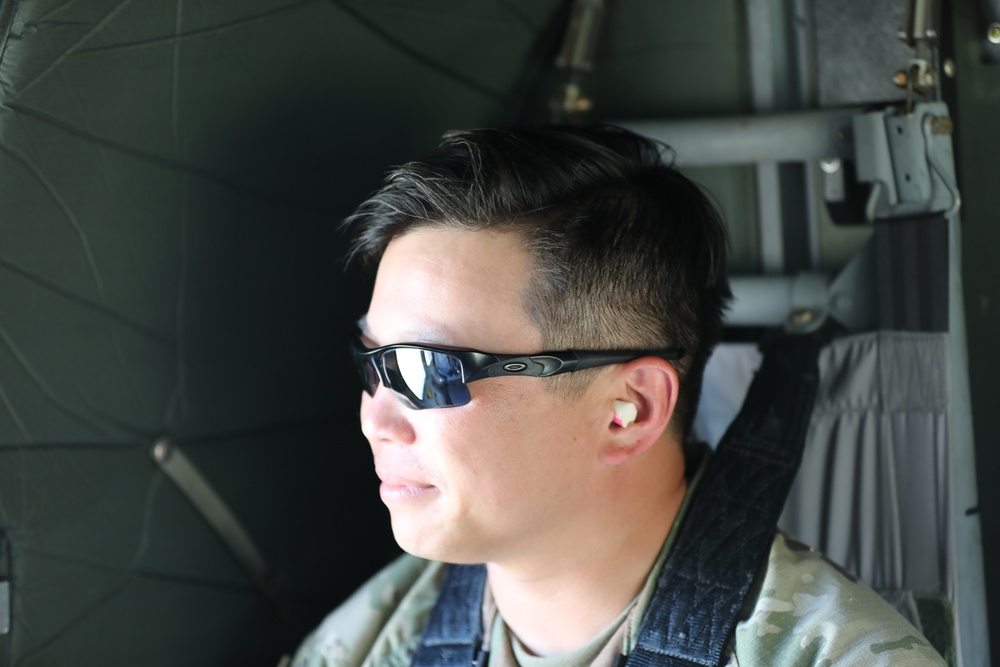 Officer Candidate School commander on UH-60 Black Hawk after training exercise