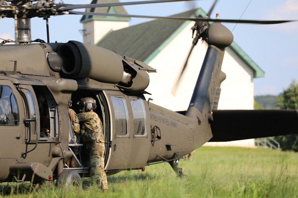 UH-60 Black Hawks land to extract Soldiers