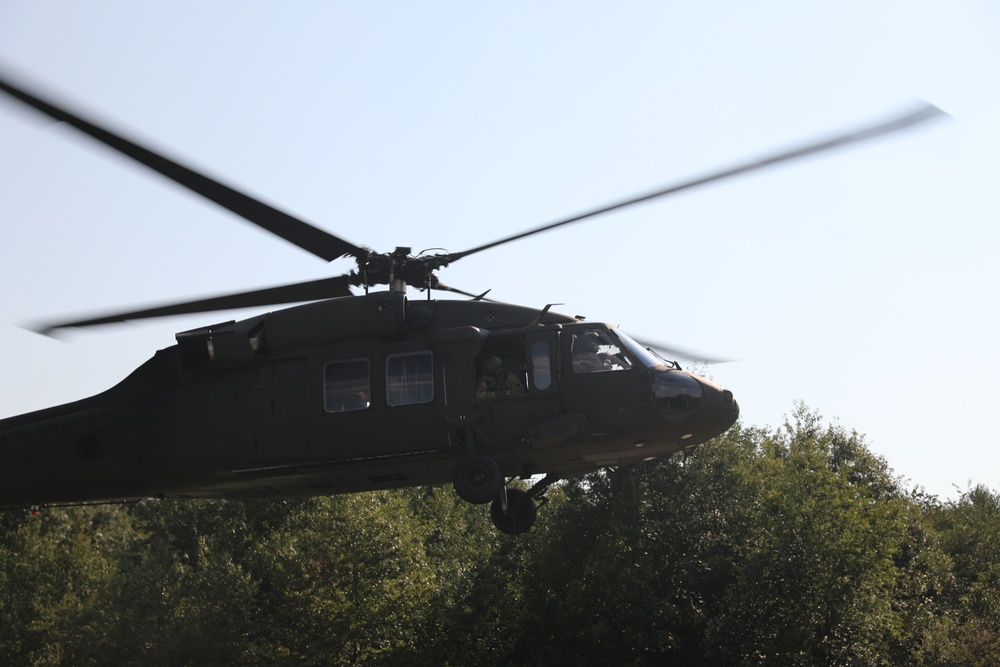 UH-60 Black Hawks land to extract Soldiers