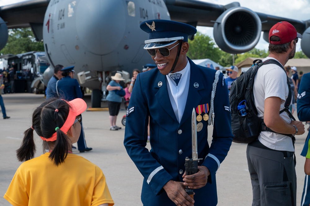 U.S. Air Force Honor Guard Drill Team performs at EAA AirVenture Oshkosh