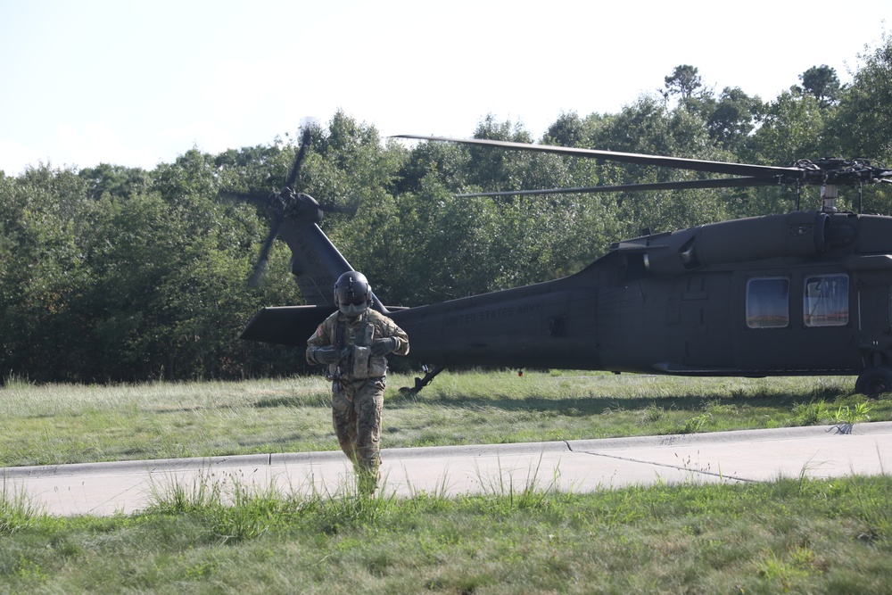 UH-60 Black Hawks land to extract Soldiers