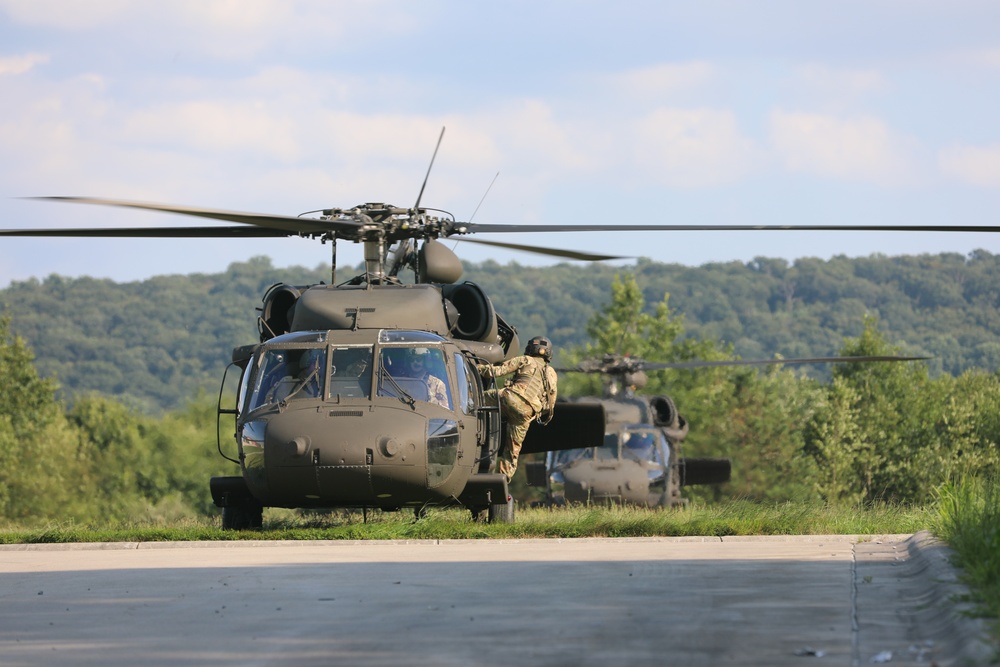 UH-60 Black Hawks land to extract Soldiers