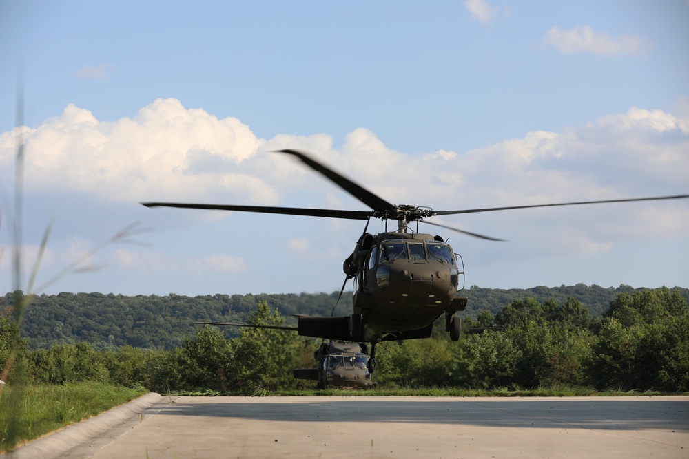 UH-60 Black Hawks land to extract Soldiers