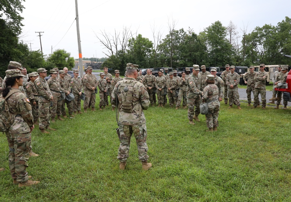 Brig. Gen. Laura McHugh hands out challenge coins