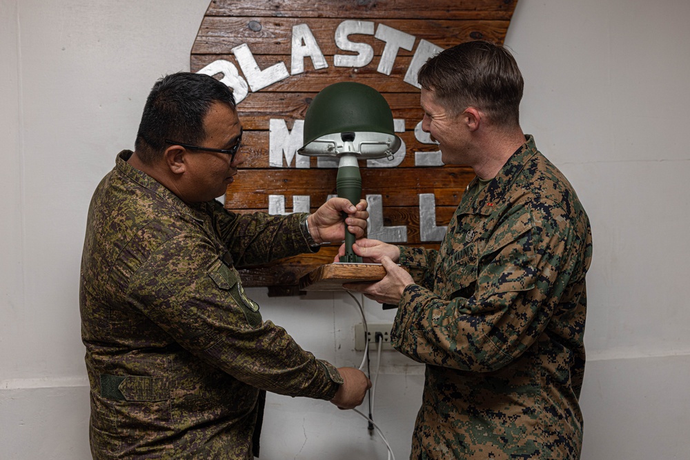 U.S. Marines with Explosive Ordnance Disposal Company, 9th Engineer Support Battalion, thanks Philippine Army Explosive Ordnance Disposal Battalion, Army Support Command.