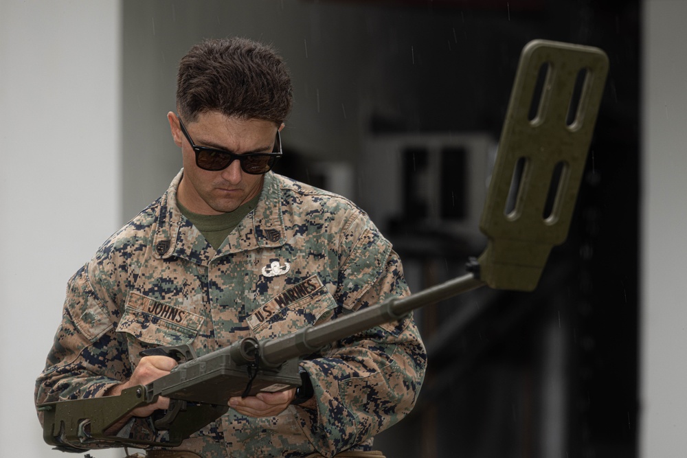 U.S. Marines with Explosive Ordnance Disposal Company, 9th Engineer Support Battalion and Philippine Army Explosive Ordnance Disposal Battalion, Army Support Command, participate in EOD simulations.